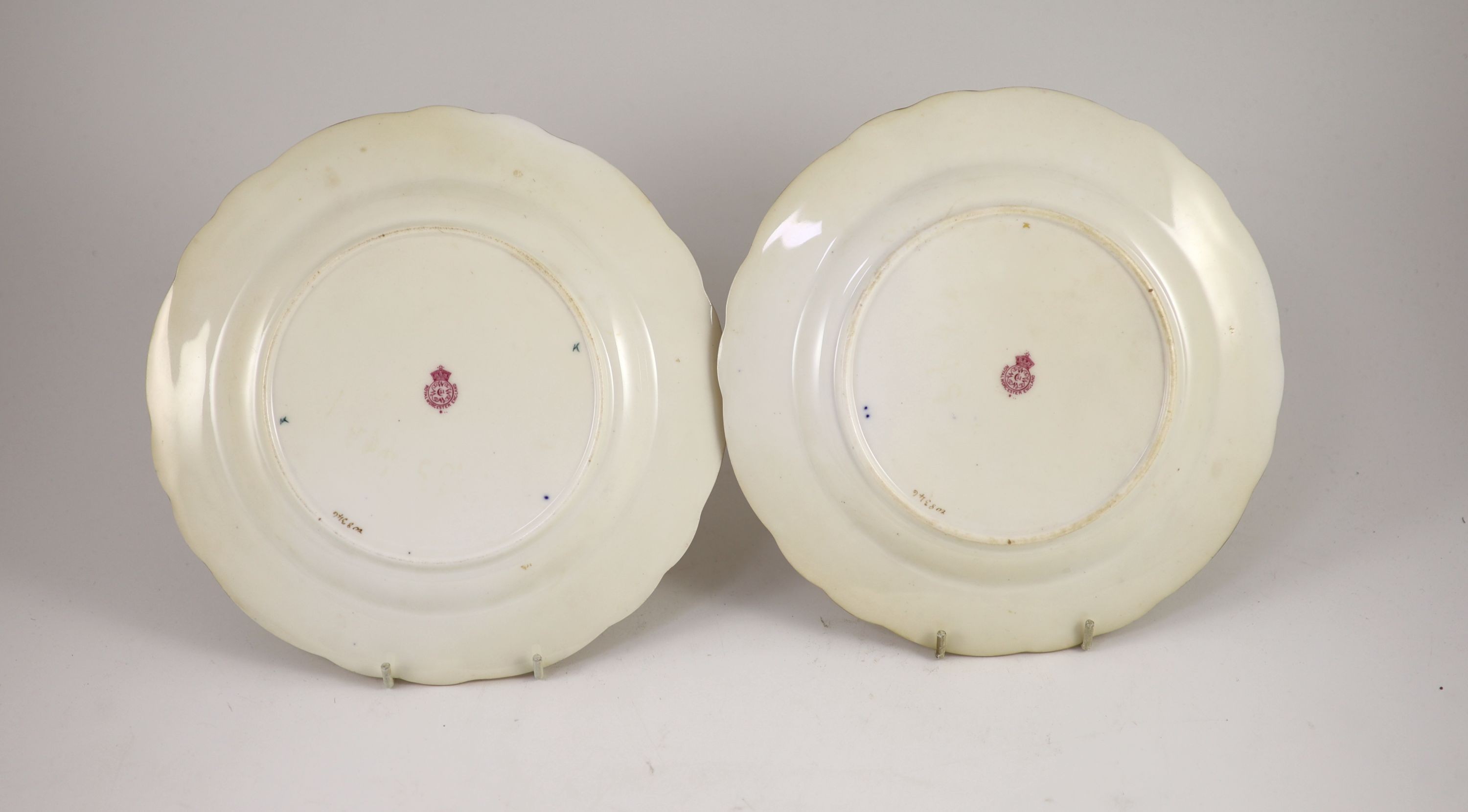 A pair of Royal Worcester fruit painted dessert plates, signed A. Shuck, c.1918, 22.5cm diameter